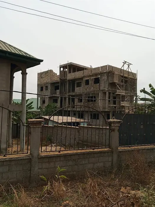 Clifton Group building construction, multi-storey structure behind site fence